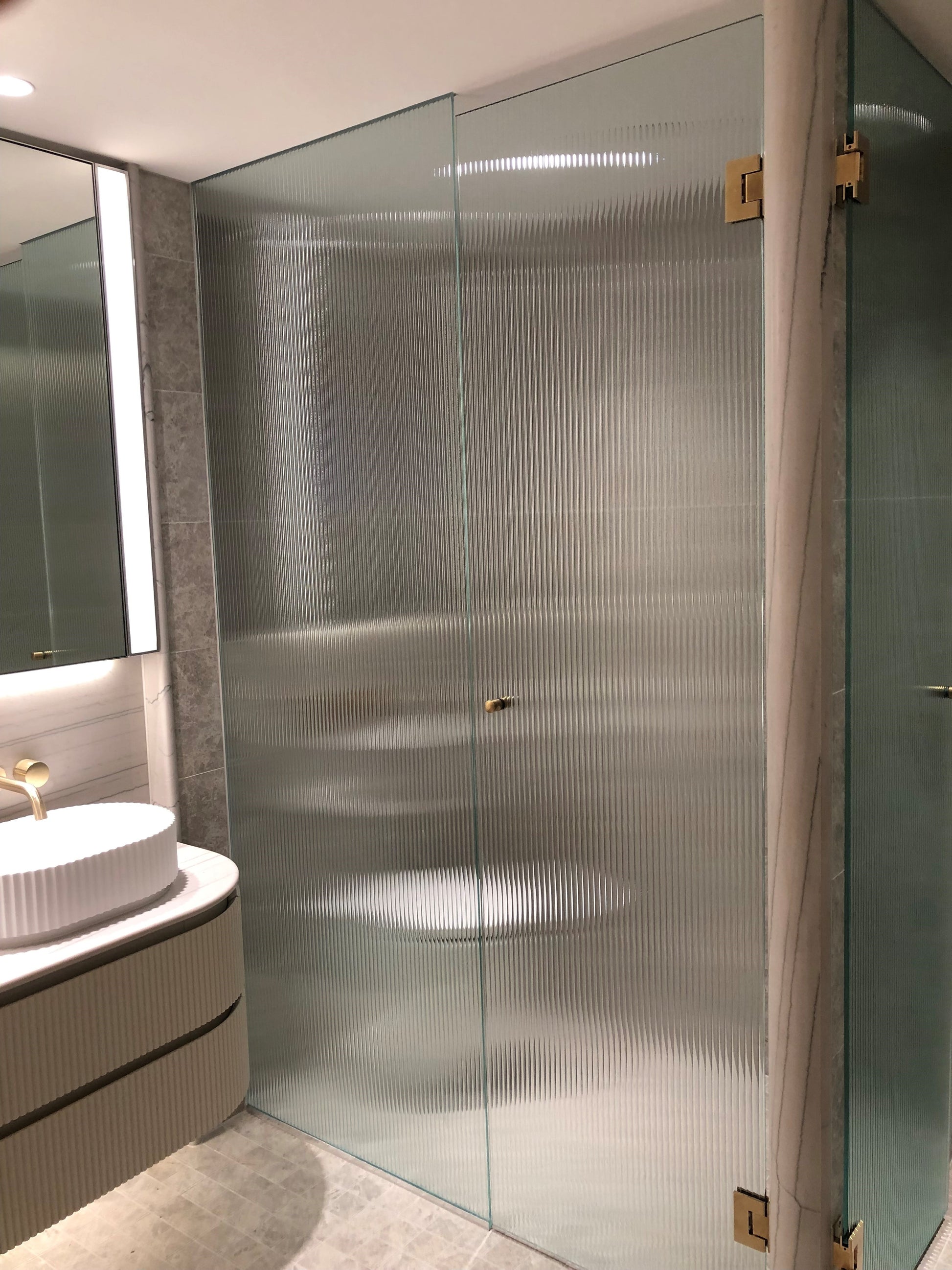 Frameless Reeded Glass Shower Screens