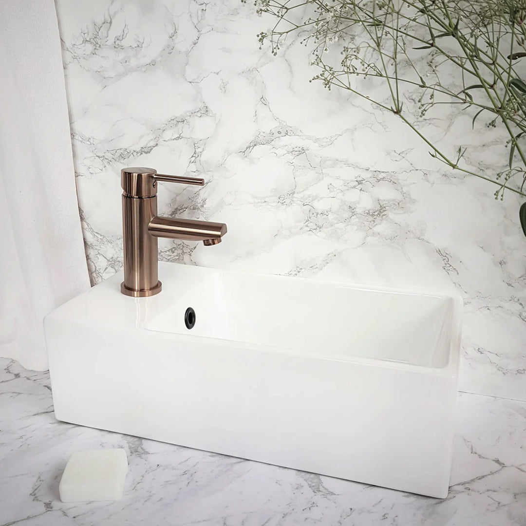 white bathroom sink with faucet