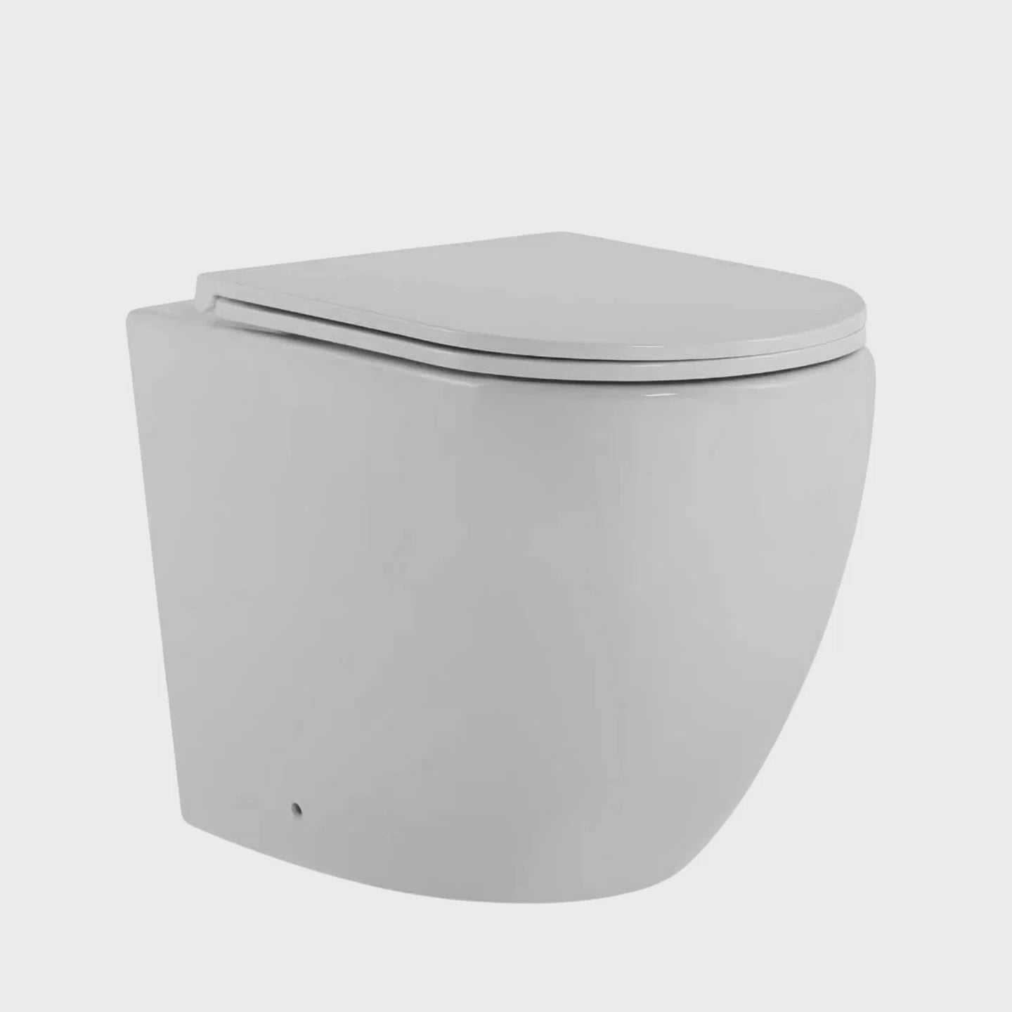 Load video: Mimi Cove Slim Rimless Wall Faced Tornado Flush Pan Only